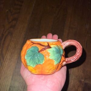 Pumpkin-Themed Orange Mug with Leaf Design